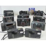 Ten assorted c1980s cameras including Cannon, Miranda, Minalter, Pentax, Olympus, Kodak etc.