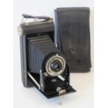 A Kodak Folding Brownie Six-20 camera, with original case.