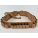 A vintage Barreteau tan leather cartridge belt, length adjustable (overall length 136cm).