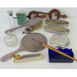 A quantity of assorted items including; silver plated hairbrush and hand held mirror set,