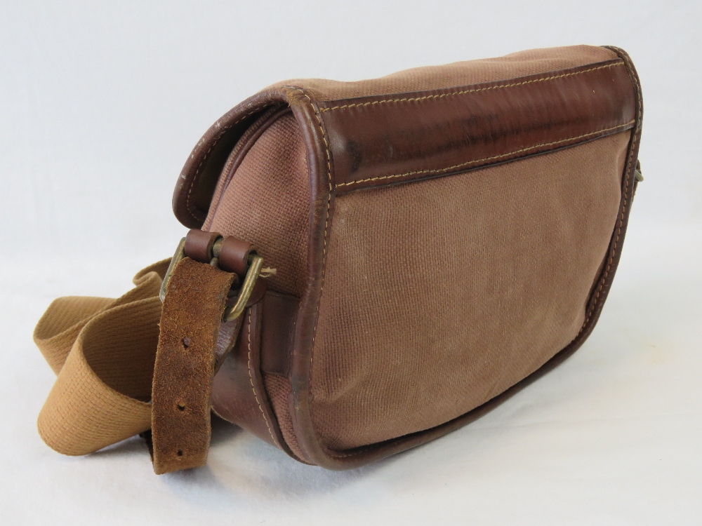 A canvas cartridge bag with leather and canvas strap, approx 25cm wide. - Image 3 of 3