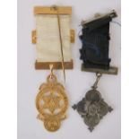 Masonic Regalia; a medallion with white ribbon,