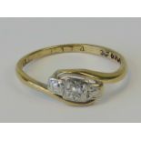 A delightful Art Deco 18ct gold, Platinum and diamond ring,