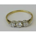 A 9ct gold ring set with three graduated white cz stones, approx 0.5ct total, size K-L, 1.2g.