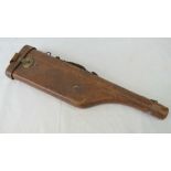 A brown leather leg o'mutton gun case for restoration, having a 'secure patent' brass lock,