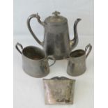 A Britannia metal three piece 19th century tea set comprising teapot, milk and sugar, a/f.