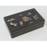 An ebonised wooden lidded Oriental box,