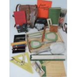 A Bagcraft ladies leather shoulder bag, a Bierette camera, drawing instruments, dressing table set,