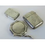 Two HM silver vesta cases; one with engraved frond pattern - Birmingham 1915,