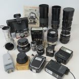 A quantity of camera lenses and equipment including; Panimex 1:3.