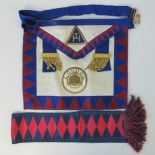 Masonic Regalia; a Royal Arch Grand Chapter apron with embroidered 'London' and Triple Tau insignia,