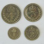 A cased full set of Elizabeth II Second Type Maundy Money dated 1958 and comprising 4p, 3p,