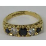 An 18ct gold diamond and sapphire five stone ring,