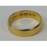 A 22ct gold band, size O-P, hallmarked London 22ct 5g.