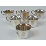 A set of six silver plated teacups (one handle a/f), each standing 6cm high.