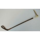 A late 19th century horn handles riding crop with silver collar hallmarked for London (date