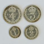 A full set of Edward VII Maundy Money dated 1907 and comprising 4p, 3p, 2p and 1p coins.