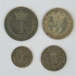 A full set of Victoria 'Young Head' Maundy Money dated 1856 and comprising 4p, 3p, 2p and 1p coins.