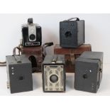 A Brownie Junior six-20, a Cartridge Hawk-i Model B 2 box camera, a No2 Brownie box camera,