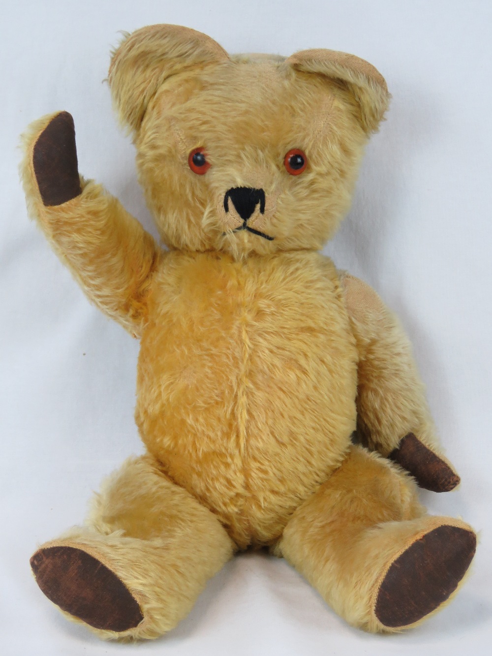 A vintage jointed mohair teddy bear, 56cm high.