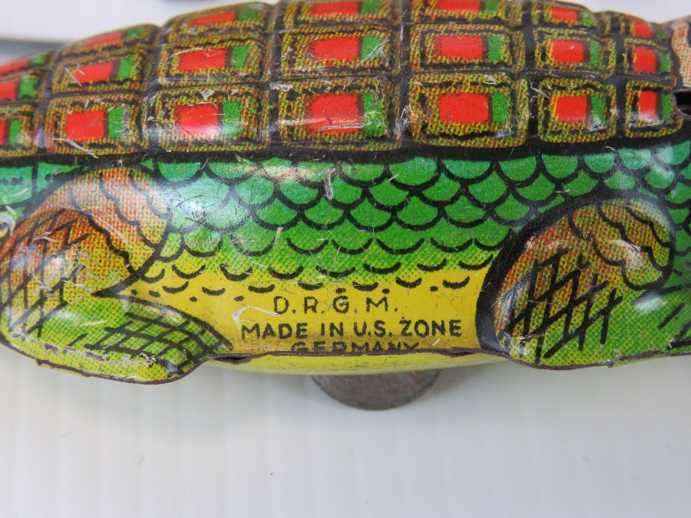 A small quantity of mid-20th century tin plate toys including; fire engine, alligator, motorbike, - Image 2 of 4