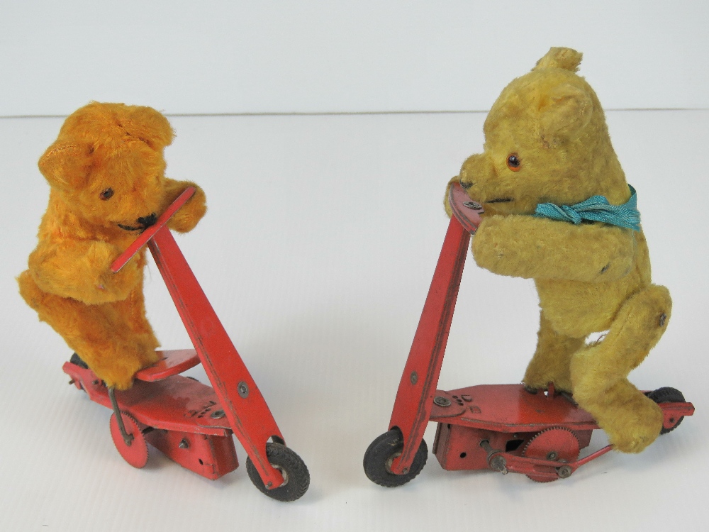 Two vintage tin plate clockwork wind up scooter riding teddy bears, unbranded. c1940-50s.