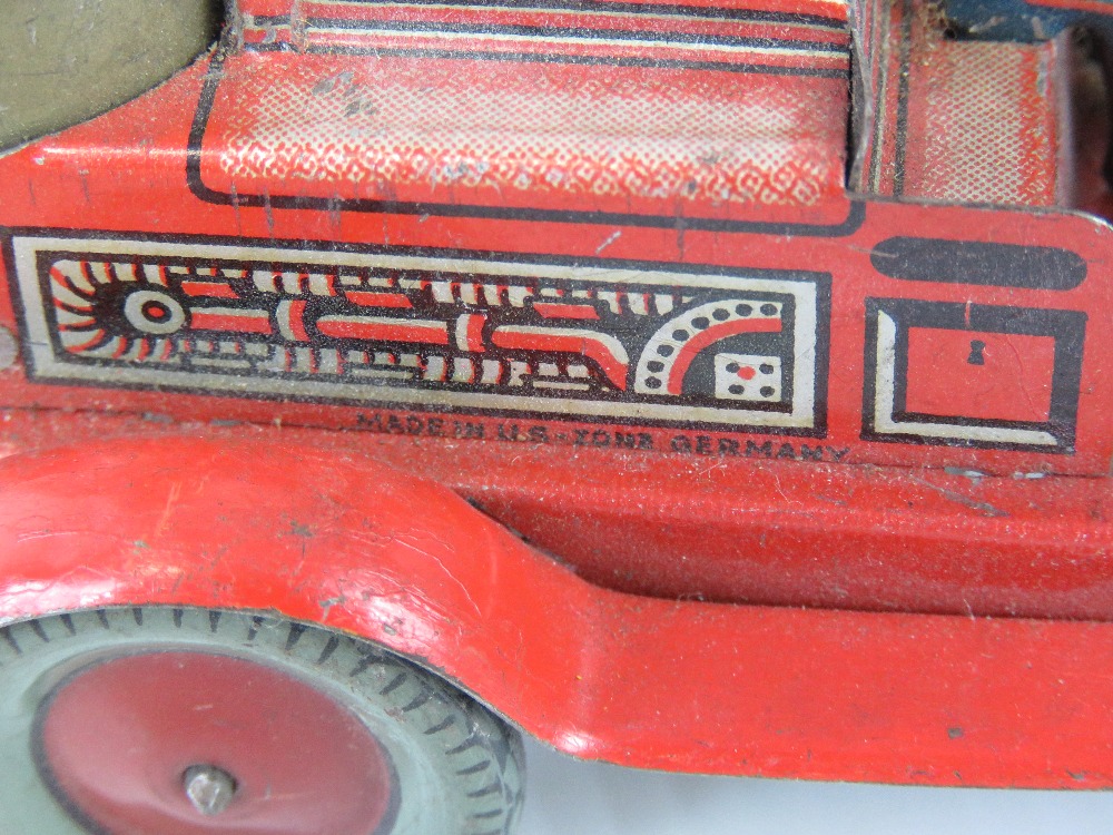 A small quantity of mid-20th century tin plate toys including; fire engine, alligator, motorbike, - Image 3 of 4