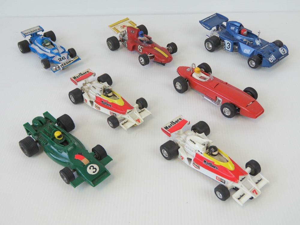 A quantity of seven Scalextric and Polistil motorised racing cars.