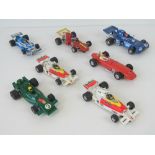 A quantity of seven Scalextric and Polistil motorised racing cars.