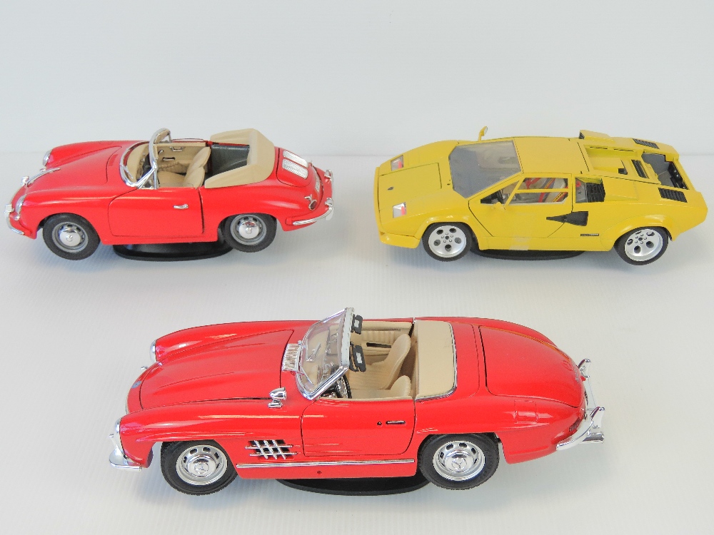 Three die-cast metal vintage Burago disp