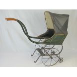 A Victorian dolls pram or pushchair with