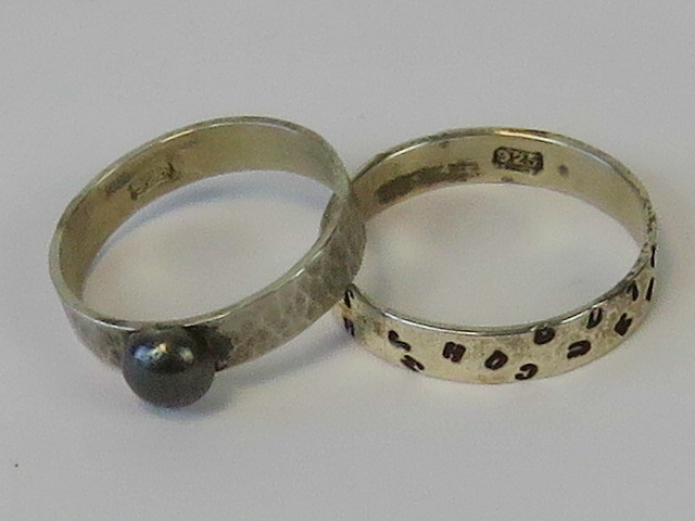 Two 925 silver rings; one with planished