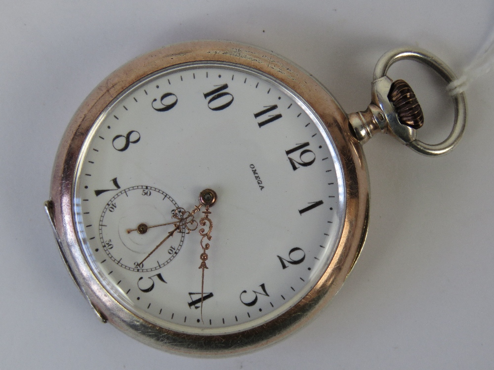 An Omega silver open face top wind pocke