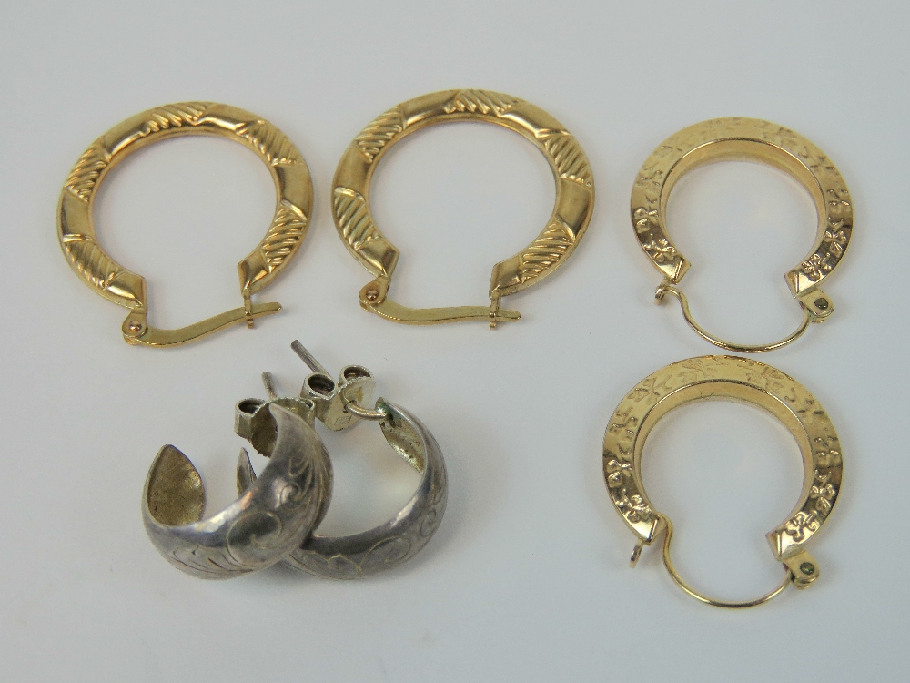 Three pairs of hoop earrings; two pairs