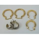 Three pairs of hoop earrings; two pairs