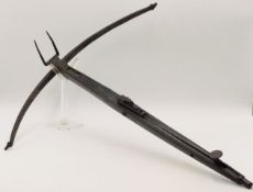 AN ANTIQUE WOOD STOCKED IRON STONEBOW 17TH/ 18TH CENTURY PROBABLY EUROPE. 60 CM LONG