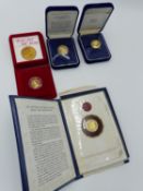 A 22CT GOLD PROOF 100 BALBOA COIN OF PANAMA 1975 TOGETHER WITH A 900/1000 GOLD PROOF 100 DOLLAR