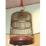 A CHINESE BAMBOO LARGE HANGING BIRDCAGE TOGETHER WITH A BAMBOO FISH TRAP (2)