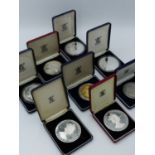 A GROUP OF ROYAL MINT COMMEMORATIVE SILVER 5 OUNCE (TROY) COINS AND MEDALS TO INCLUDE FALKLANDS,
