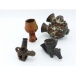 FOUR AFRICAN POTTERY SMOKING PIPE BOWLS