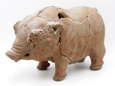 A RARE LARGE INDONESIAN (JAVA) TERRACOTTA PIG, PROBABLY MAJAPAHIT KINGDOM,14TH/15TH CENTURY. 34 CM