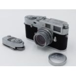 A ERNST LEITZ LEICA M2 CAMERA S.No M2-970488 WITH LEITZ ELMAR F-5CM 1:2.8 LENS C/W INSTUCTION MANUAL