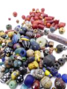 A COLLECTION OF ANTIQUE AND ARCHAIC GLASS AND OTHER BEADS INCLUDING MILLEFIORI EXAMPLES (QTY)