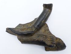 AN EARLY CAST BRONZE FRAGMENT HAND AND FOOT OF BUDDHA THE ELONGATED FINGERS IN A PALM UP POSITION.