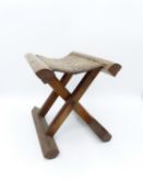 TWO ORIENTAL FOLDING STOOLS, ONE WITH WOVEN CLOTH SEAT.