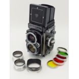 A FRANKE & HEIDECKE ROLLEIFLEX TWIN LENS REFLEX CAMERA ,MODEL 2.8F, S.No 2412232, ZEISS PLANAR 1:2.8