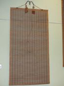 A GROUP OF FIVE JAPANESE BAMBOO SCREEN BLINDS WITH SILK EDGING AND METAL SUSPENSION HOOKS.