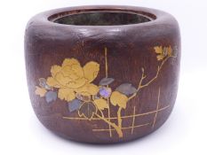 A JAPANESE ELM COPPER LINED TEA KETTLE WARMER. THE EXTERIOR WITH LACQUER DECORATION OF TRELLIS AND