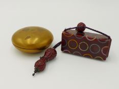 A JAPANESE INRO CASE, RED LACQUER DECORATION INSET WITH SILVER , GOLD AND ABALONE, A LACQUERED OJIME