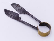 AN INTERESTING PAIR OF WROUGHT IRON AND BRASS TRIMMING SHEARS, THE BLADES SIGNED HAWKINS, 12 CM